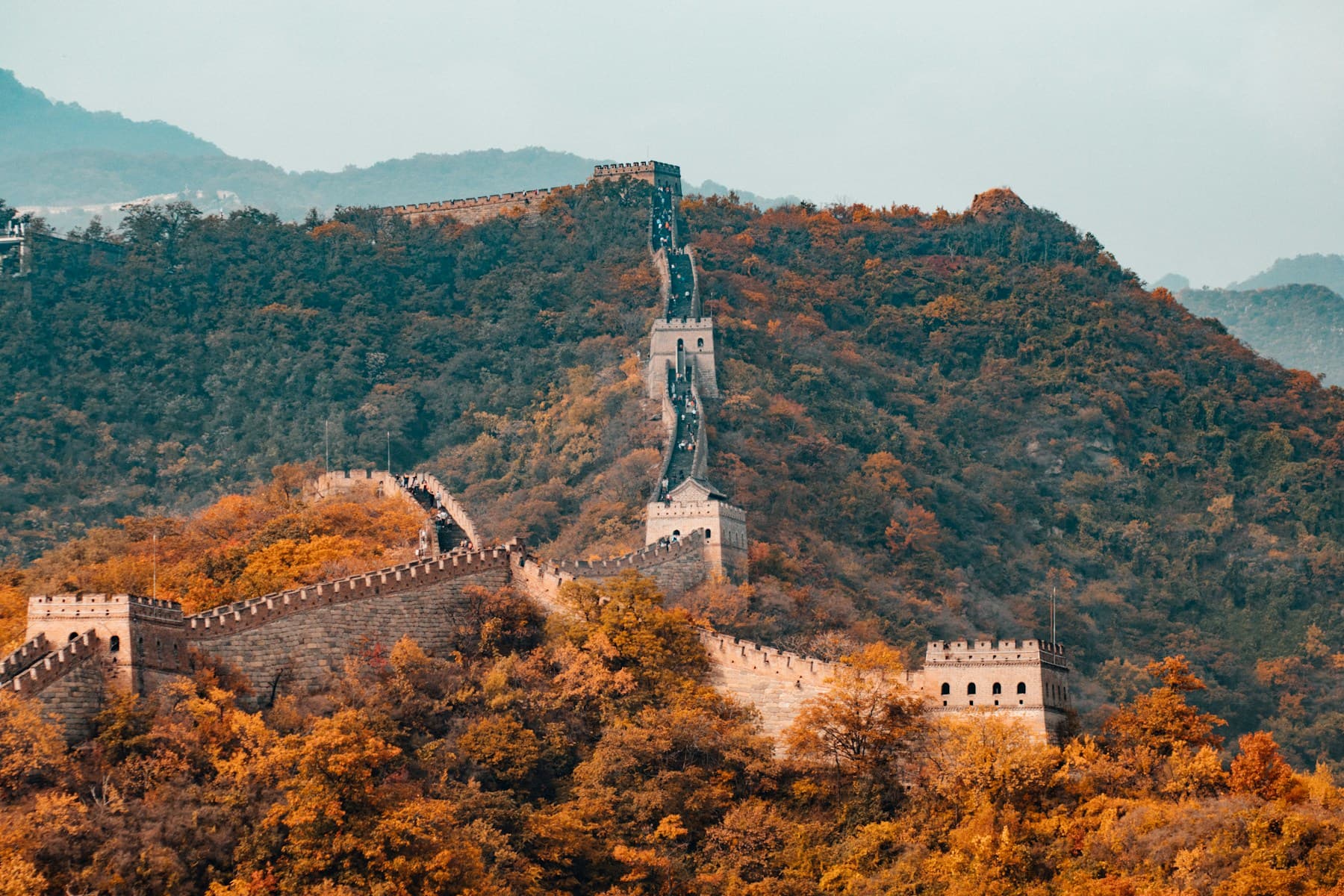 The Great Wall winding through autumn mountains in China